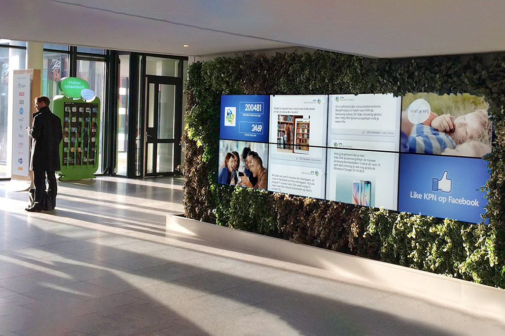 plant wall with oblong digital display