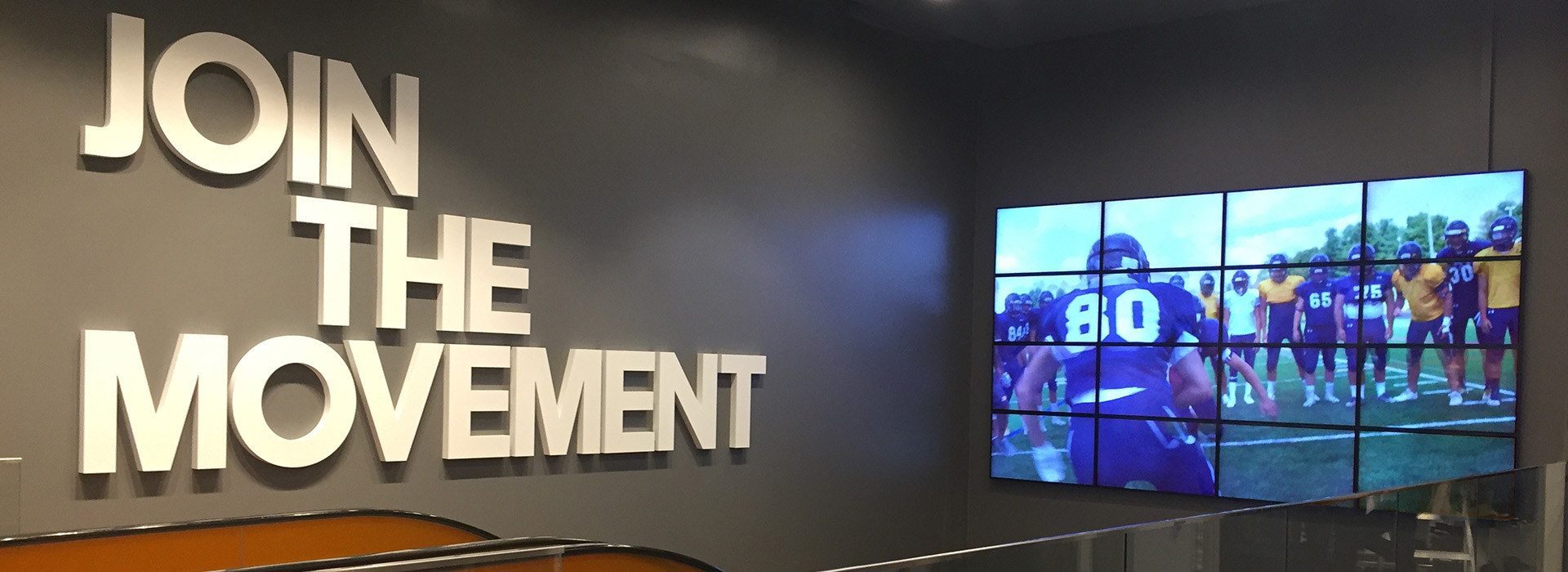 Stadium wall with powerstatement- join the movement